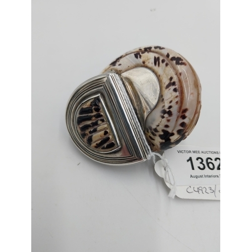 1362 - Irish silver mounted sea shell snuff box, the silver lid inset with ridged shell. No hallmarks. Circ... 