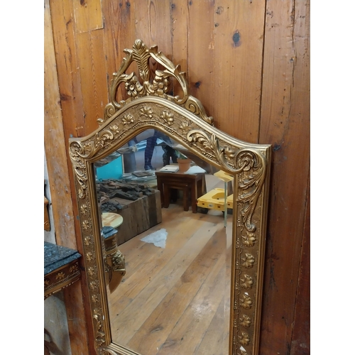 109 - Decorative gilt wall mirror in the Victorian style {115 cm H x 64 cm W}.