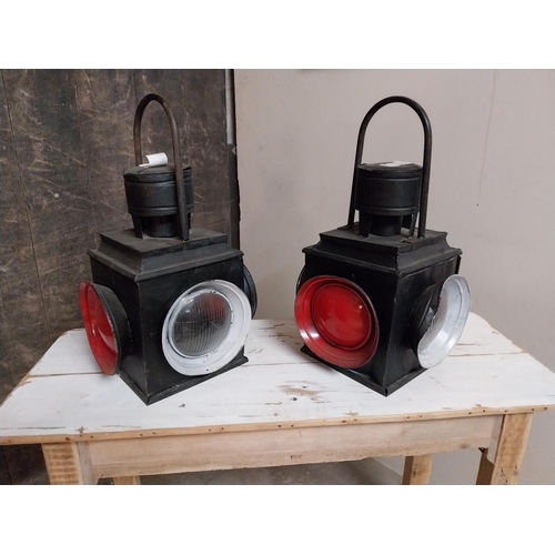 11 - Pair of metal railway signal lamps {55 cm H x 32 cm W x 30 cm D}.