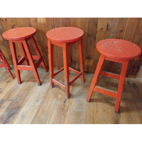 129 - Collection of four Irish painted pine bar - pub stools {Approx. 80 cm H x 40 cm W x 40 cm D}.