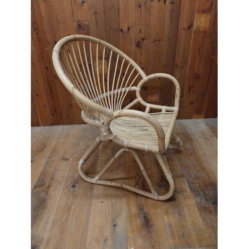 130 - Retro wicker armchair {84 cm H x 72 cm W x 67 cm D}.