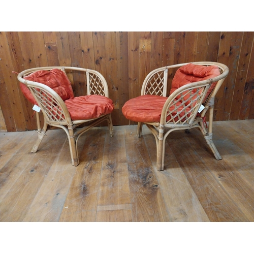 131 - Pair of retro wicker armchair with red upholstered removeable cushions {70 cm H x 70 cm W x 70 cm D}... 