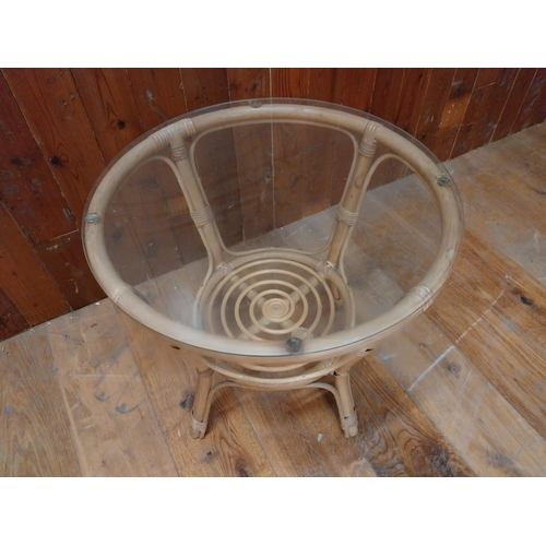 135 - Vintage wicker coffee table with glass top {60 cm H x 60 cm W x 60 cm D}.