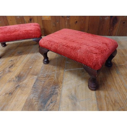 138 - Two vintage mahogany and upholstered foot stools {32 cm H x 47 cm W x 32 cm D}.