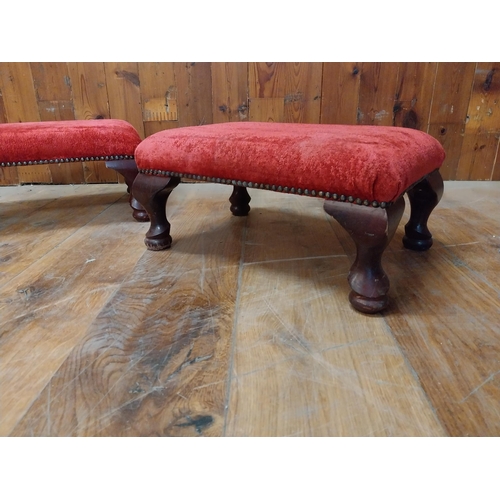 138 - Two vintage mahogany and upholstered foot stools {32 cm H x 47 cm W x 32 cm D}.