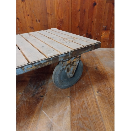 140 - Retro industrial metal and wooden coffee table on wheels {32 cm H x 120 cm W x 80 cm D}.