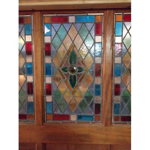 146 - 19th C. mahogany panel with four stained glass panels {208 cm H x 222 cm W x 5 cm D}.