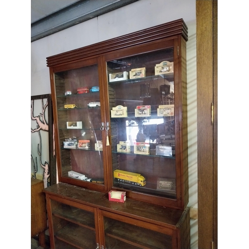 147 - Early 20th C. mahogany Chemist cabinet with four glazed doors {230 cm H x 140 cm W x 40 cm D}.