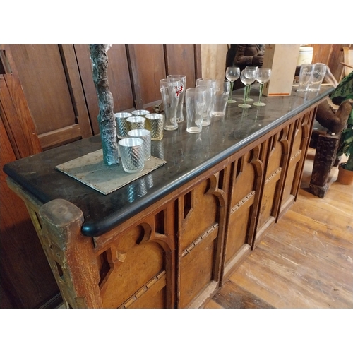 159 - 19th C. scumbled pine bar counted with marble top in the Gothic style {104 cm H x 210 cm W x 50 cm D... 