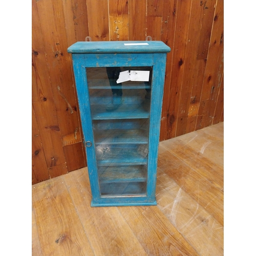 196 - Painted hardwood wall cabinet with single glazed door {80 cm H x 36 cm W x 18 cm D}.