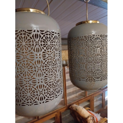 199 - Pair of good quality decorative enamel hanging lanterns {53 cm H x 26 cm W x 26 cm D}.