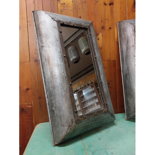 224 - Pair of Retro industrial metal cushion wall mirrors {78 cm H x 45 cm W x 12 cm D}.