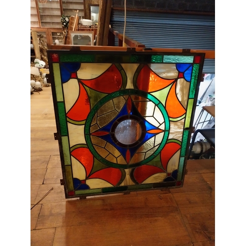 237 - Leaded stained glass panel mounted in metal frame {109 cm H x 98 cm W x 4 cm D}.