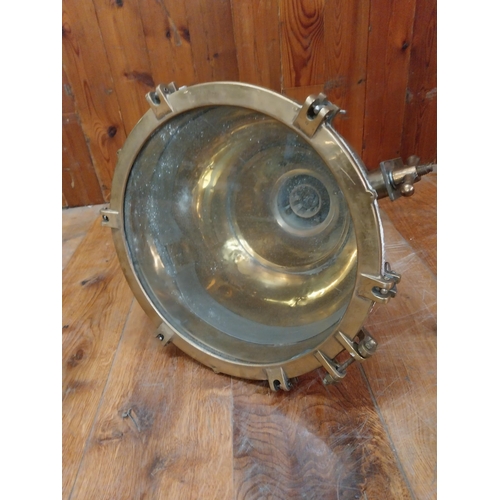 275 - Rare early 20th C. brass ships search light {57 cm H x 50 cm W x 50 cm D}.