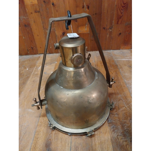 276 - Rare early 20th C. brass ships search light {57 cm H x 50 cm W x 50 cm D}.