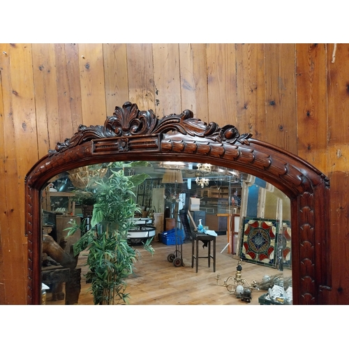 277 - Good quality carved mahogany wall mirror in the Victorian style {181 cm H x 140 cm W x 12 cm D}.