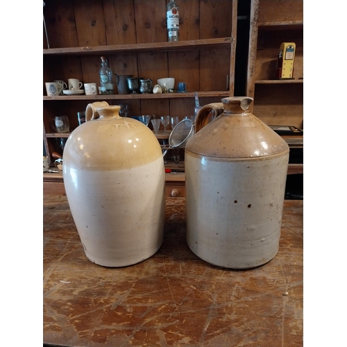 287 - Two early 20th C. glazed stoneware Whiskey jars {38 cm H x 25 cm Dia.}.