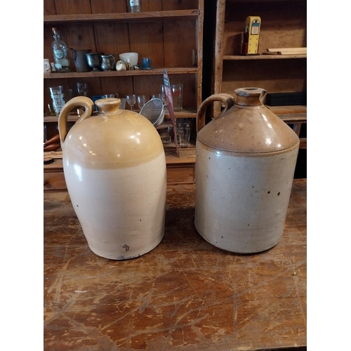 287 - Two early 20th C. glazed stoneware Whiskey jars {38 cm H x 25 cm Dia.}.