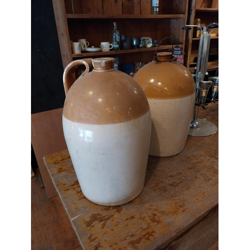 288 - Two early 20th C. glazed stoneware Whiskey jars {43 cm H x 27 cm Dia.}.