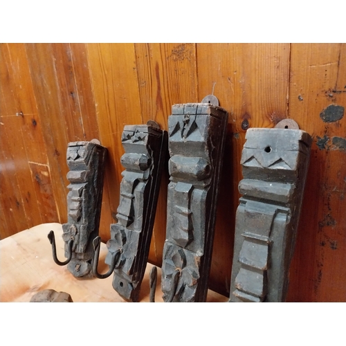 294 - Collection of six carved hardwood wall mounted coat hangers {Approx. 20  cm H x 8 cm W x 9 cm D}.