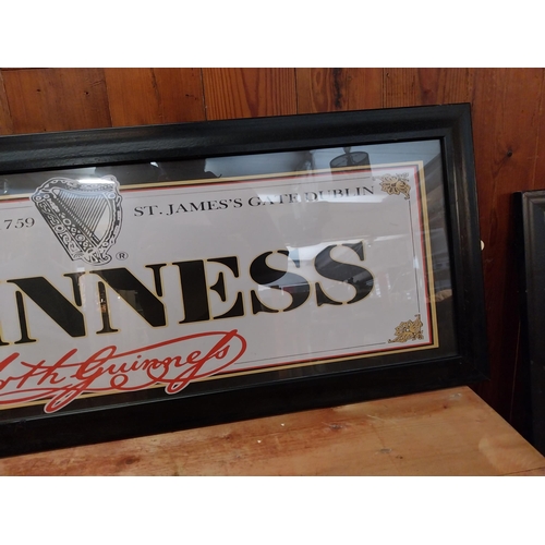 338 - Guinness coloured framed advertising print {38 cm H x 101 cm W}.