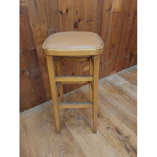 342 - Pine bar - pub stool with upholstered vinyl seat {74 cm H x 33 cm W x 33 cm D}.