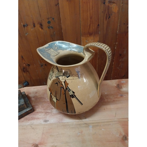 346 - Ceramic model of a water pump and glazed ceramic water jug {40 cm H x 17 cm W x 12 cm D and 27 cm H ... 