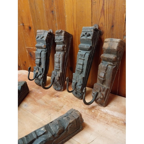 350 - Collection of six carved hardwood wall mounted coat hangers {Approx. 20  cm H x 8 cm W x 9 cm D}.