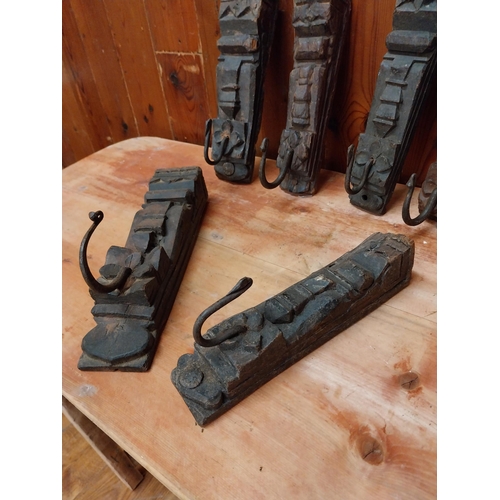 350 - Collection of six carved hardwood wall mounted coat hangers {Approx. 20  cm H x 8 cm W x 9 cm D}.