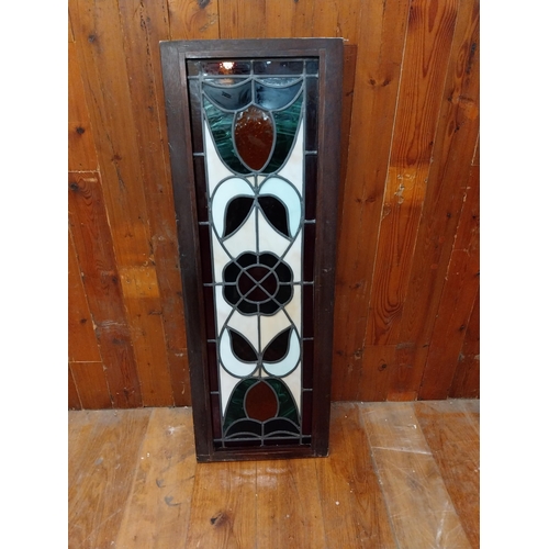 355 - Good quality leaded stain glass panel mounted in mahogany frame {125 cm H x 44 cm W x 5 cm D}.