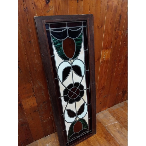 355 - Good quality leaded stain glass panel mounted in mahogany frame {125 cm H x 44 cm W x 5 cm D}.