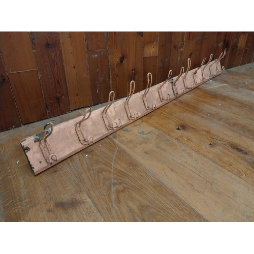 356 - Early 20th C. painted pine wall coat rack with metal hooks {20 cm H x 153 cm W x 13 cm D}.