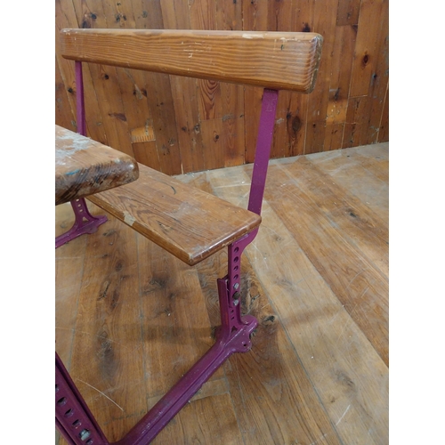 382 - 1950s pitch pine and cast iron double adjustable school desk {70 cm H x 102 cm W x 72 cm D}.