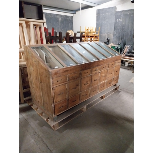 398 - Good quality early 20th C. hardwood shop cabinet with twenty-one bank of drawers {103 cm H x 191 cm ... 