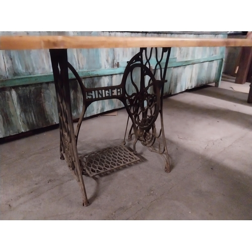 417 - Good quality pine pub table with cast iron singer sewing machine base {74 cm H x 120 cm W x 70 cm D}... 