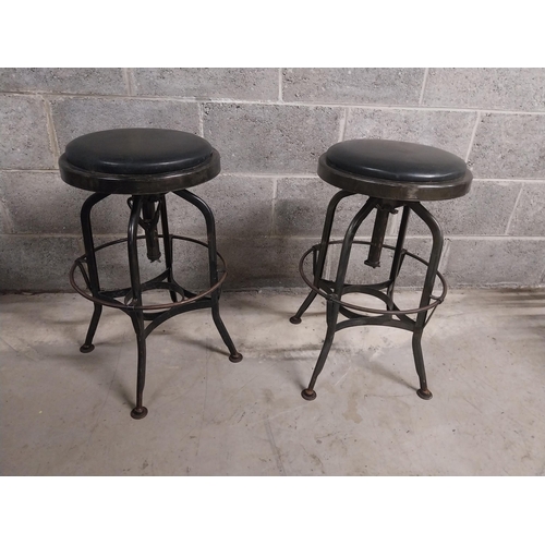 419 - Pair of industrial metal bar - pub stools with leather upholstered seats {61 cm H x 49 cm W x 49 cm ... 