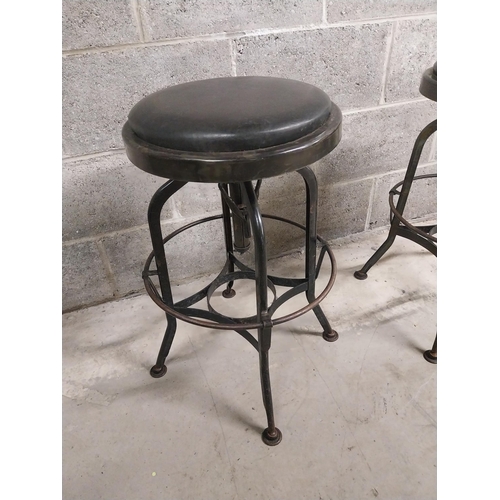 419 - Pair of industrial metal bar - pub stools with leather upholstered seats {61 cm H x 49 cm W x 49 cm ... 