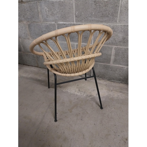 436 - Good quality aluminium faux rattan armchair on wrought iron base{80 cm H x 63 cm W x 63 cm D}.