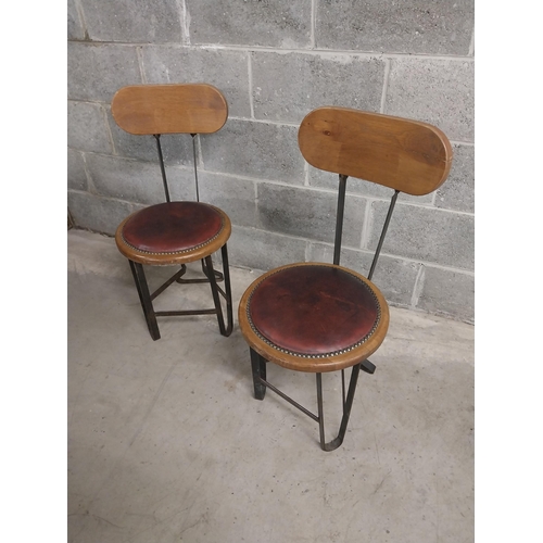 455 - Pair of bar - pub chairs with oak and leather upholstered seats on wrought iron bases {86 cm H x 40 ... 