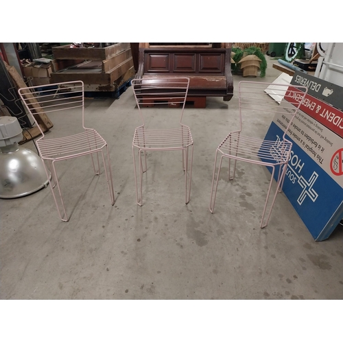 489 - Set of four painted metal chairs {83 cm H x 43 cm W x 52 cm D}.