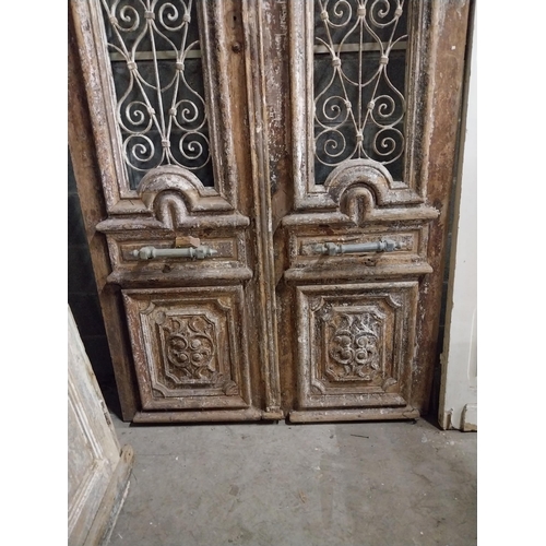 509 - Good quality pair of 18th C. painted pine doors with carved panels and wrought iron panels and bronz... 