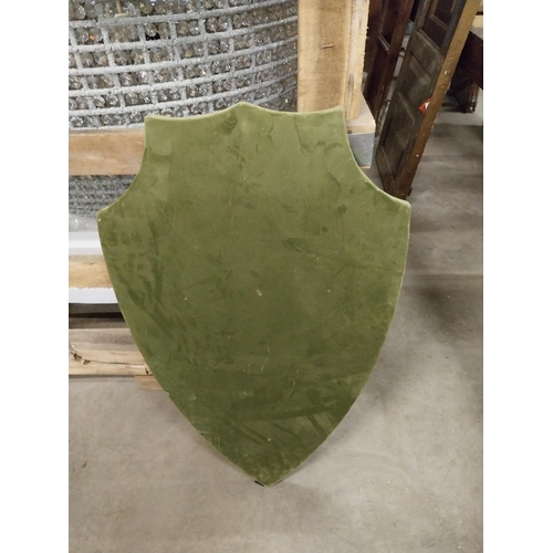 519 - Crushed velvet and pine wall mounted shield {86 cm H x 56 cm W x 3 cm D}.