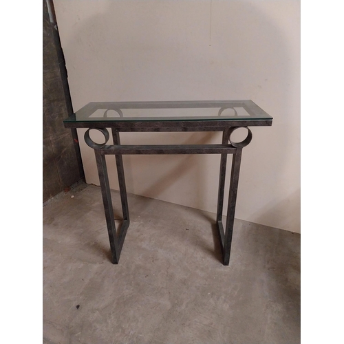 55 - Bronzed metal designer side table with glass top {78 cm H x 82 cm W x 36 cm D}.