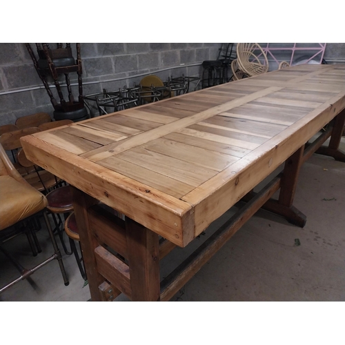 82 - Good quality pine high bar - pub table raised on pedestal support and double stretcher {117 cm H x 3... 