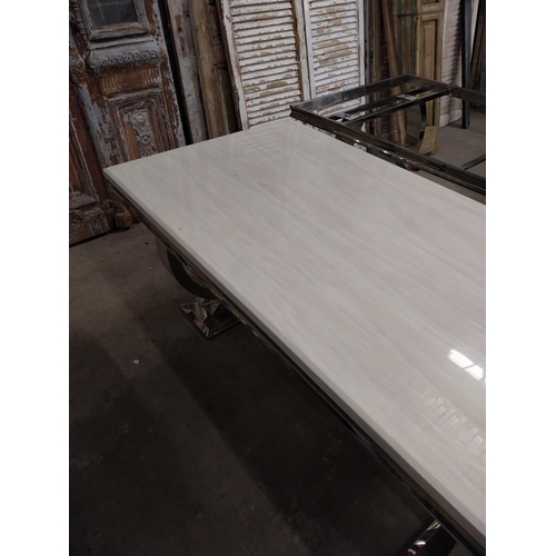 527 - Designer chrome table with marbleised top {77 cm H x 181 cm W x 91 cm D}.