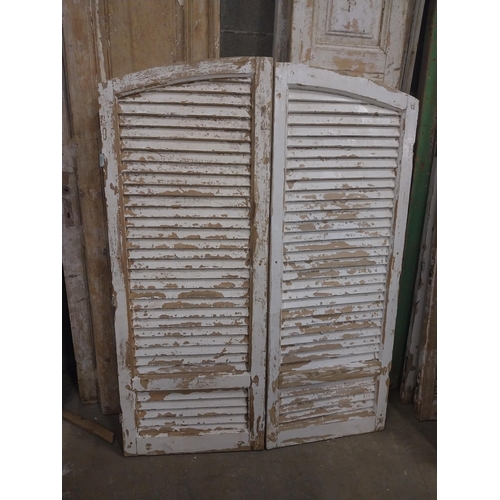 538 - Pair of 19th C. Louvre pine window shutters {150 cm H x 113 cm W x 5 cm D}.