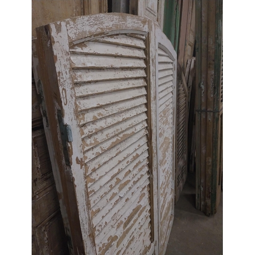 538 - Pair of 19th C. Louvre pine window shutters {150 cm H x 113 cm W x 5 cm D}.