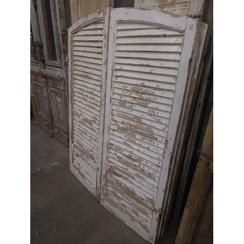 538 - Pair of 19th C. Louvre pine window shutters {150 cm H x 113 cm W x 5 cm D}.