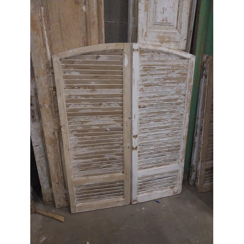 539 - Pair of 19th C. Louvre pine window shutters {146 cm H x 113 cm W x 5 cm D}.