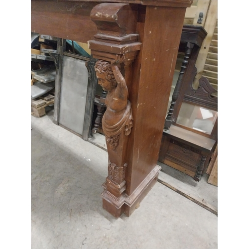 547 - Unusual French wooden chimney piece decorated with Cherubs {115 cm H x 301 cm W x 38 cm D}.